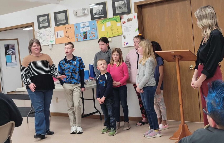 4-H members participate in a Hunger Dinner held Saturday, March 9, to educate attendees about food insecurity in Warren County.