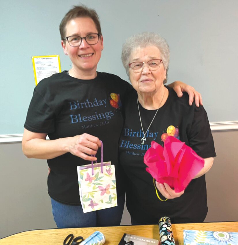 Shannon VonAllmen, Executive Director of Birthday Blessings, and volunteer Jackie Kelly wrap birthday gifts for kids in foster care. Last year the nonprofit filled more than 1,750 service requests from Missouri kids experiencing foster care.