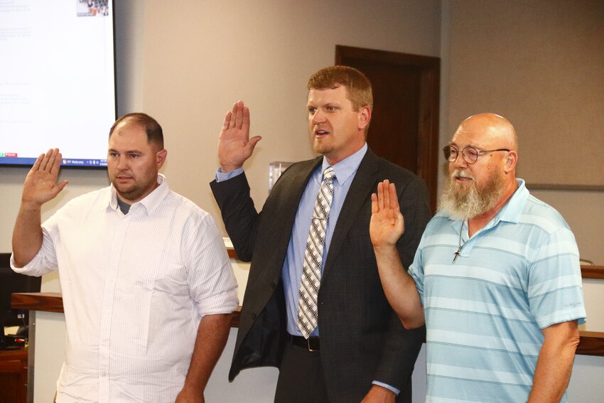 Aldermen Brandon Lang (left), Scott Schulze (middle), and Jack Crump (right), were sworn in at the April 16 Warrenton Board of Aldermen meeting.