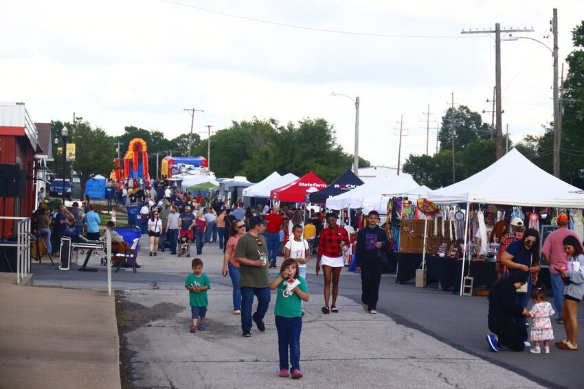 Residents of Wright City and surrounding communities gathered on First Street for the beginning of the city's &quot;First Fridays&quot; celebrations. The first event included Hispanic music from Tropic Moods STL as well as the usual vendors, food and activities in honor of the Cinco de Mayo holiday.
