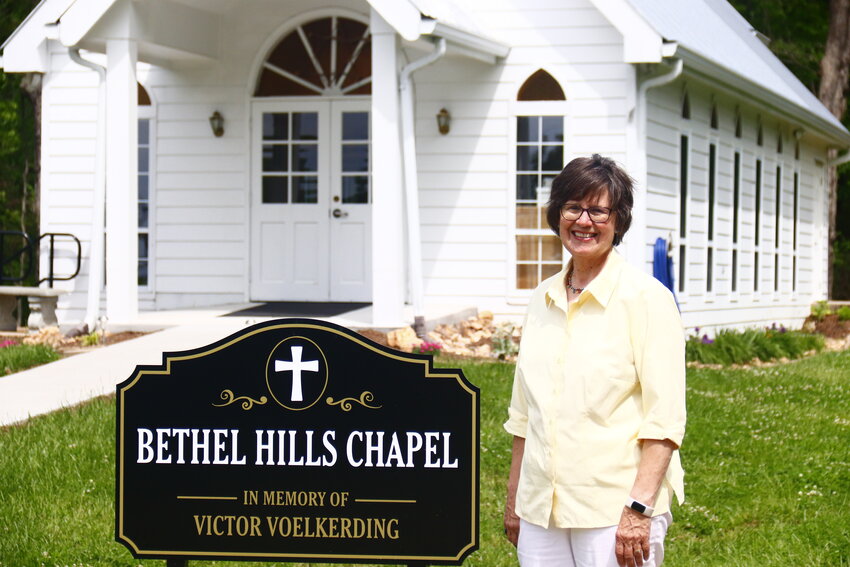 Billie Kramme outside the Bethel Hills on the property where residents hold weekly services.
