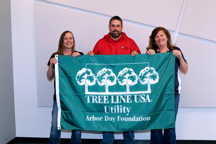 Cuivre River Electric Cooperative's Right-of-Way Department celebrates being named a 2024 Tree Line USA Utility by the Arbor Day Foundation. Pictured from left to right: Tina Brocke, Benjamin Voss and Patty Williams.