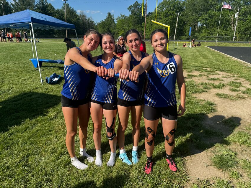 Members of the Wright City girls 4x400 relay team consisting of Elizabeth Riggs, Ada Ferrell, Lindsay Pettus and Lydia Clubb pose after qualifying for the Class 3 state meet.