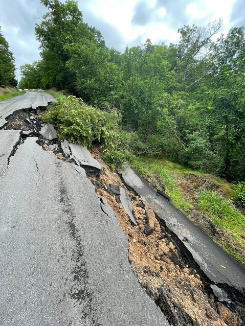 The slide caused extensive damage to the roadway.