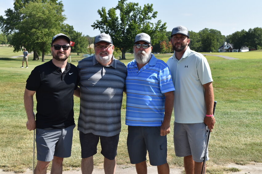 Father and son duos, from left, Jordan and Rich Barton and
James and Brett Davis participated in AGAPE’s annual golf
tournament this past Friday. The foursome all matched in
their Schraer Heating and Cooling hats.