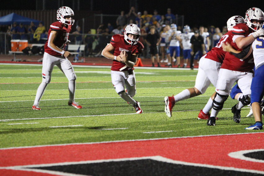 Senior Austin Haas receives the ball and runs into the endzone for a three-yard rushing touchdown.