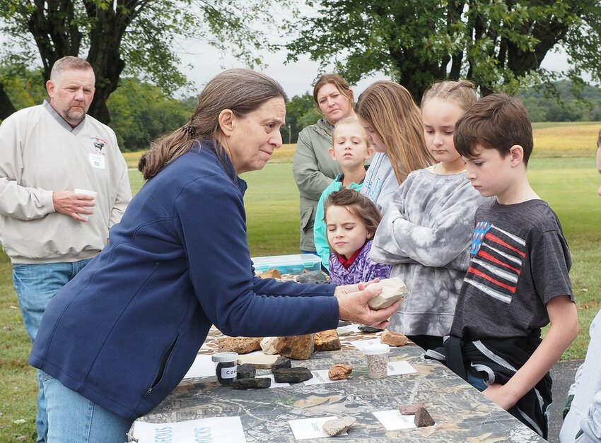 Alicia Muhm, volunteer educator, was named the Conservation Educator of the year according to Polly Sachs of the Warren County Soil & Water Conservation District. Muhm has been a presenter of rocks and minerals during the organization's student farm tours for many years. She continued her volunteer efforts during the Concord Hill farm tour help Tuesday, Sept. 24 at St. Ignatius School.