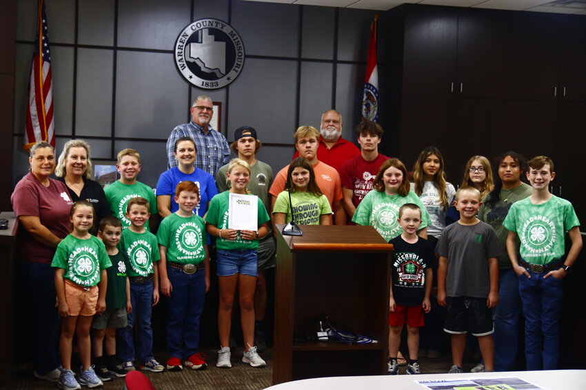 Pictured above are representatives from all nine 4-H Clubs in Warren County, Presiding Commissioner Joe Gildehaus and Commissioner Matt Flake. Commissioner Tom Meyer was absent.