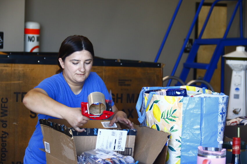 Mel Heredia with Tiger Socks packs up a box of donations and preparations were made for the truck to ship out later that week. In just over a week, Tiger Docks and Reliable Trucking Services in Wright City were able to raise enough funds and collect enough supplies to send two truckloads to help those impacted by Hurricane Helene in North Carolina.