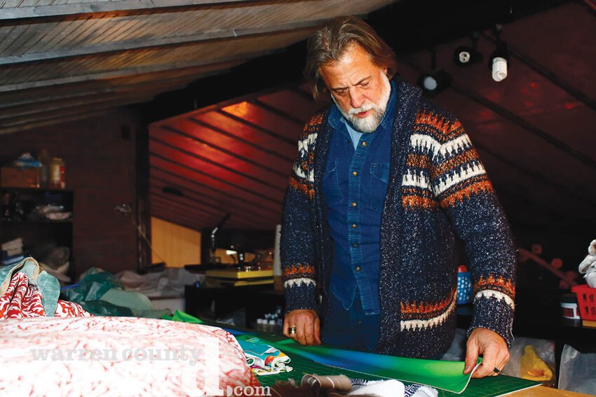 Illumiwear Co-Founder Marshall McClure works on a new scarf in his workshop just north of Marthasville. For every sale the company contributes $3 to Best Buddies Missouri.
