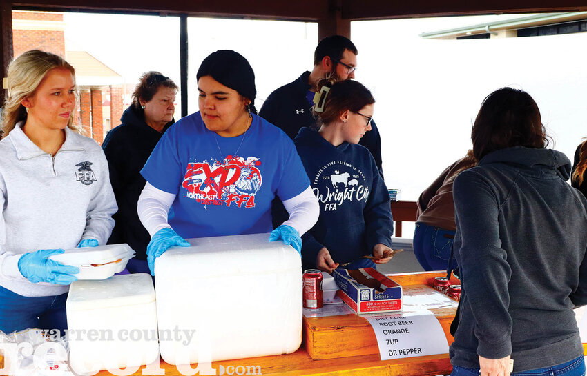 Pictured, from left: Shelby Brakensiek and Miley Sosa serve customers at the Wright City FFA Fish Fry on the afternoon of March 7 at the FMB Bank Pavilion.