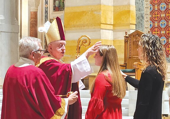 Holy Rosary School and PSR students received the Holy Spirit at their confirmation March 22 at the Cathedral Basilica in St. Louis. Archbishop Mitchell Rozanski officiated the ceremony making them full members of the Catholic Church.