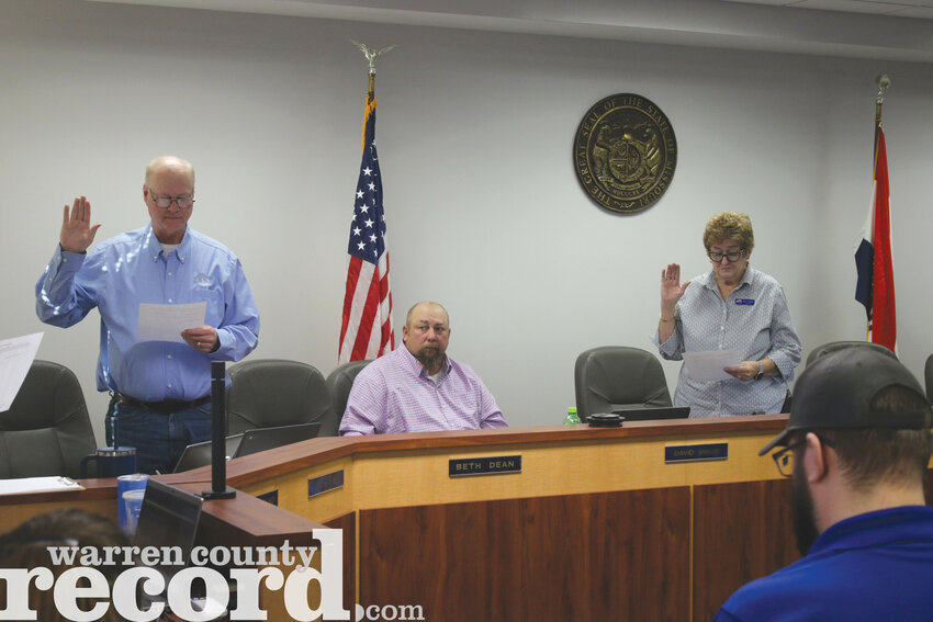 Incumbents Austin Jones, left, and Mary Groeper, right, were officially sworn in to the Wright City R-II Board of Education on April 15.