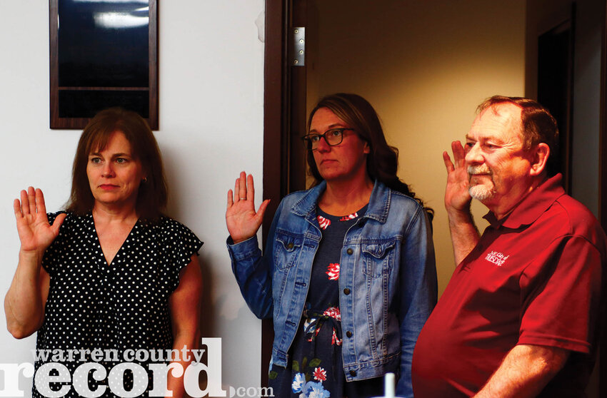 Alderman Ellen Wortham, left, Alderman Kari Hartley, middle and Mayor Jerry Cannon were sworn in for their new terms at the April 23 Truesdale Board of Aldermen meeting.