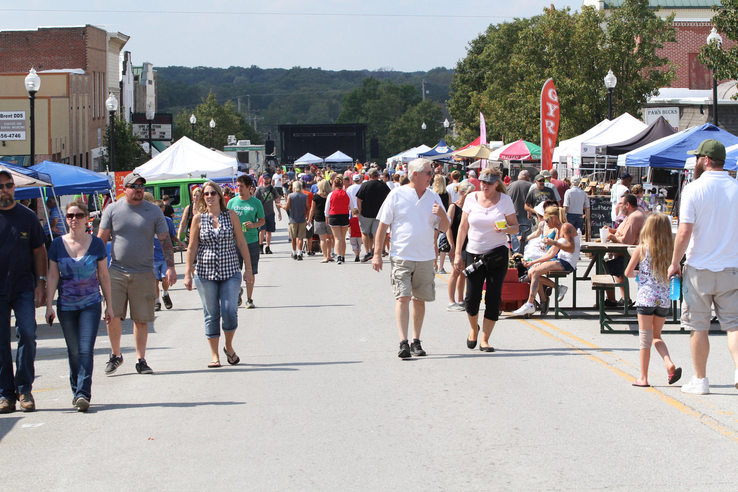Visitors travel between vendor booths in downtown Warrenton during a previous Fall Festival.