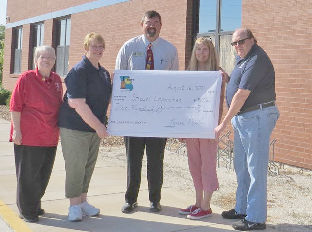 Rebecca Boone Elementary teacher Shari Leppanen, second from right, receives a $500 classroom grant from the Missouri Retired Teachers Foundation. With her, from left, are retired teachers association members Sherry Brandes and Marsha Burns, Principal Steve Weeks, and association member Guy Schreck.