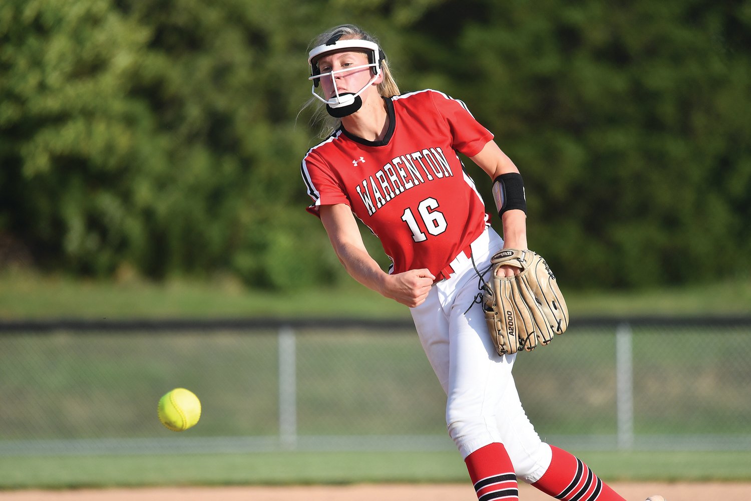 ACE ON THE MOUND — Warrenton senior hurler Kathryn McChristy delivers a pitch in a game earlier this season. The right-hander earned the win in relief, striking out seven and walking one.