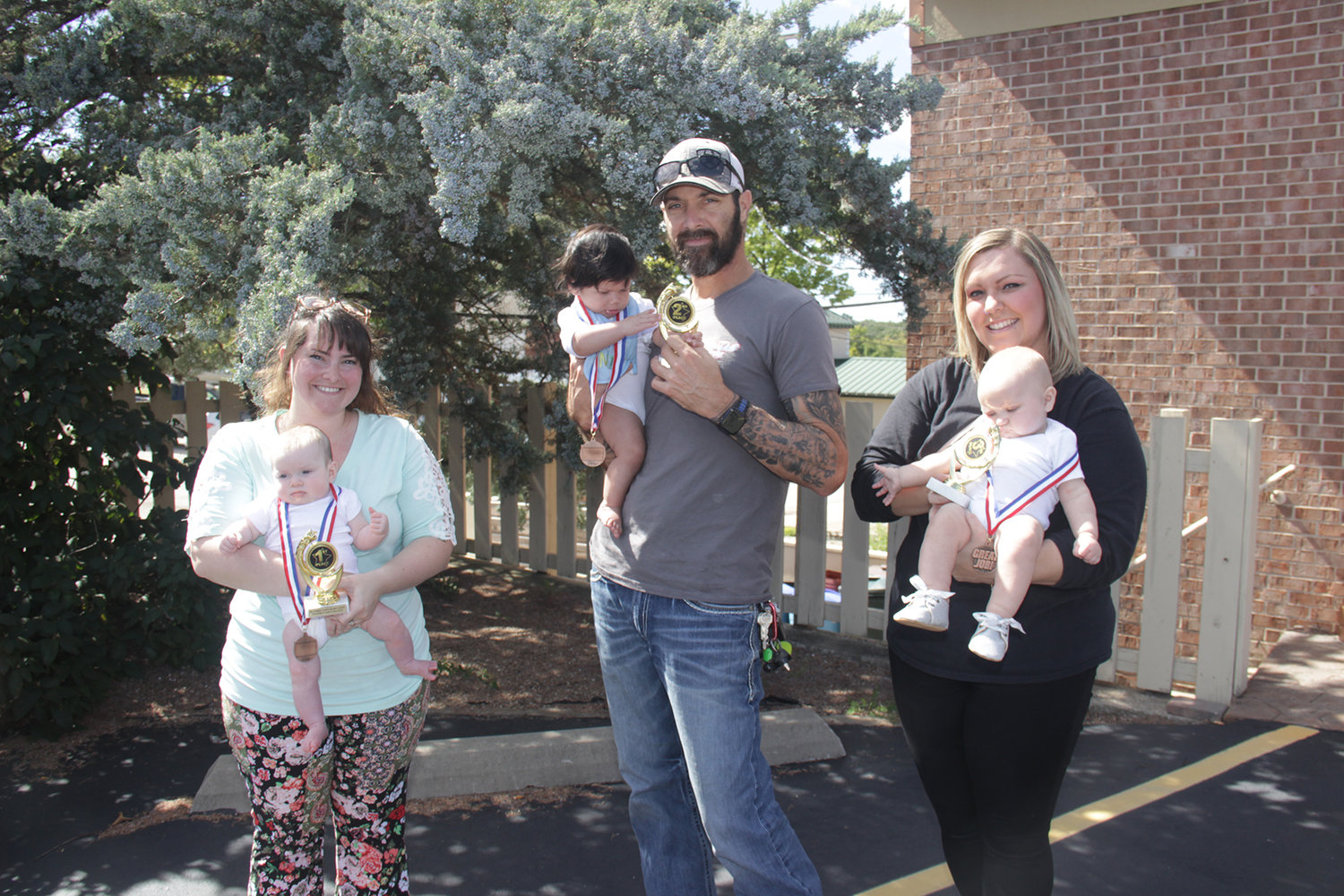 BABY CONTEST 0-6 MONTHS — First place: Rory Philbin, held by Kayla Philbin; Second place: Adalynn Burke, held by Chris Burke; Third place: Stella Johler, held by Ashleigh Reece.
