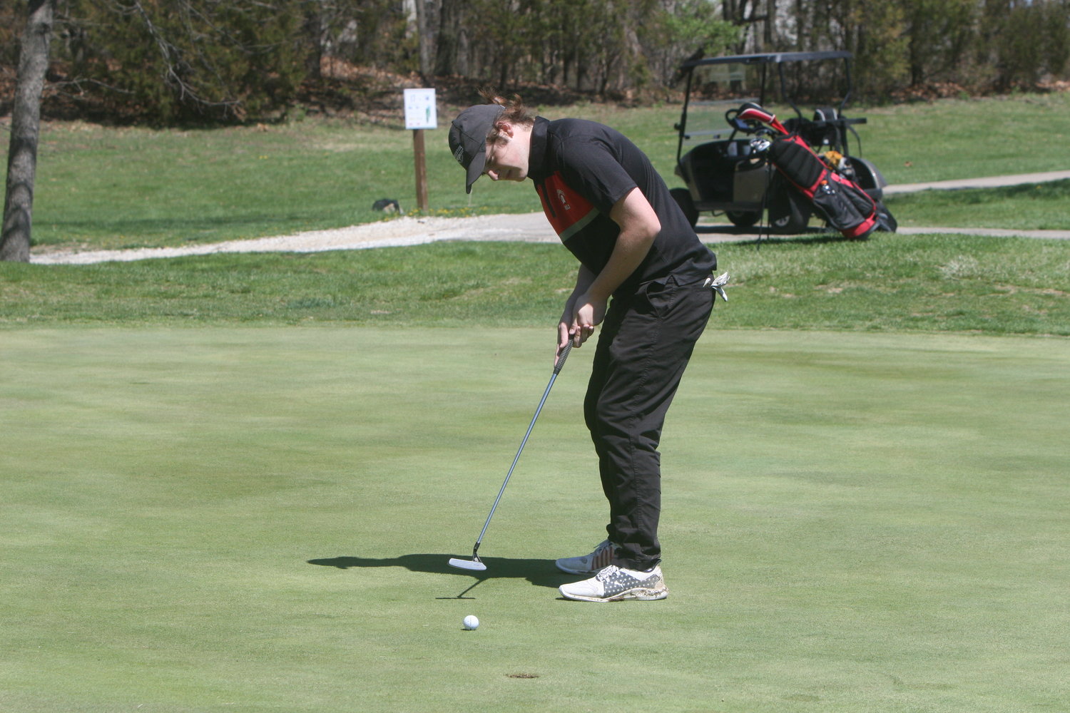 Bryce Goulette attempts a putt at a match earlier this season.
