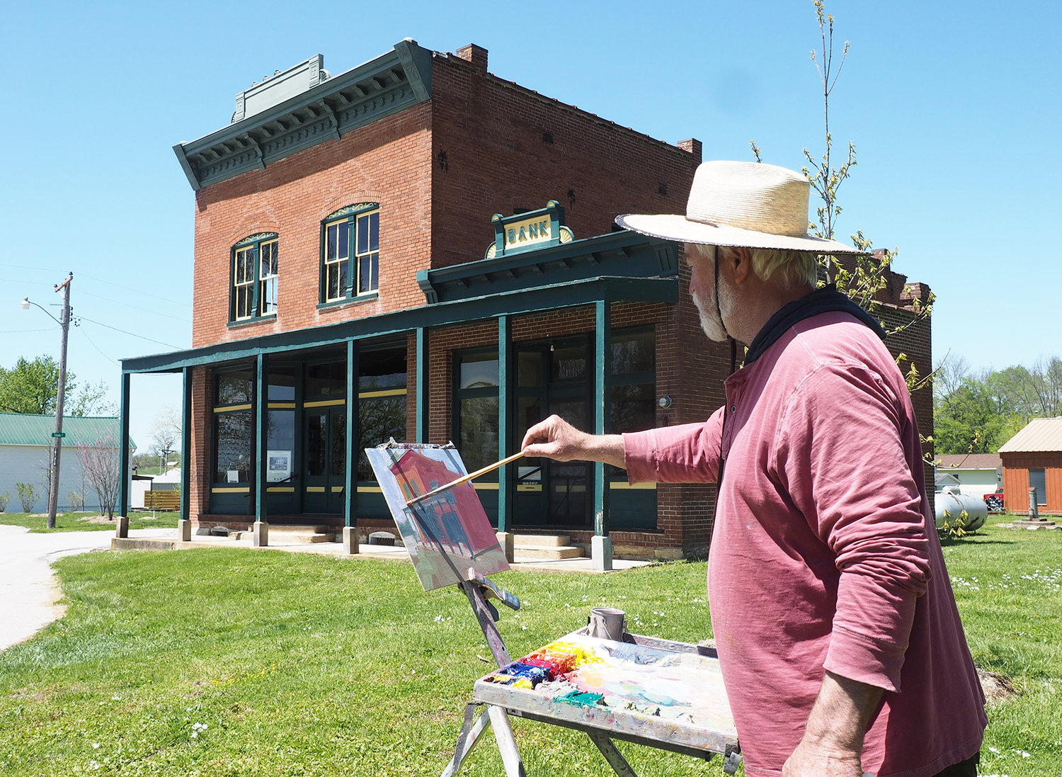 ARTIST VISITS TRELOAR — Artist “Billy O” O’Donnel, of Burns Mill, uses the Treloar Mercantile as his subject in a recent visit to the Country Store Corridor. He is the founder of Artists Along the Katy Trail project and is known as one of the top plein air painters. The Treloar Mercantile was just listed on the National Register of Historic Places.