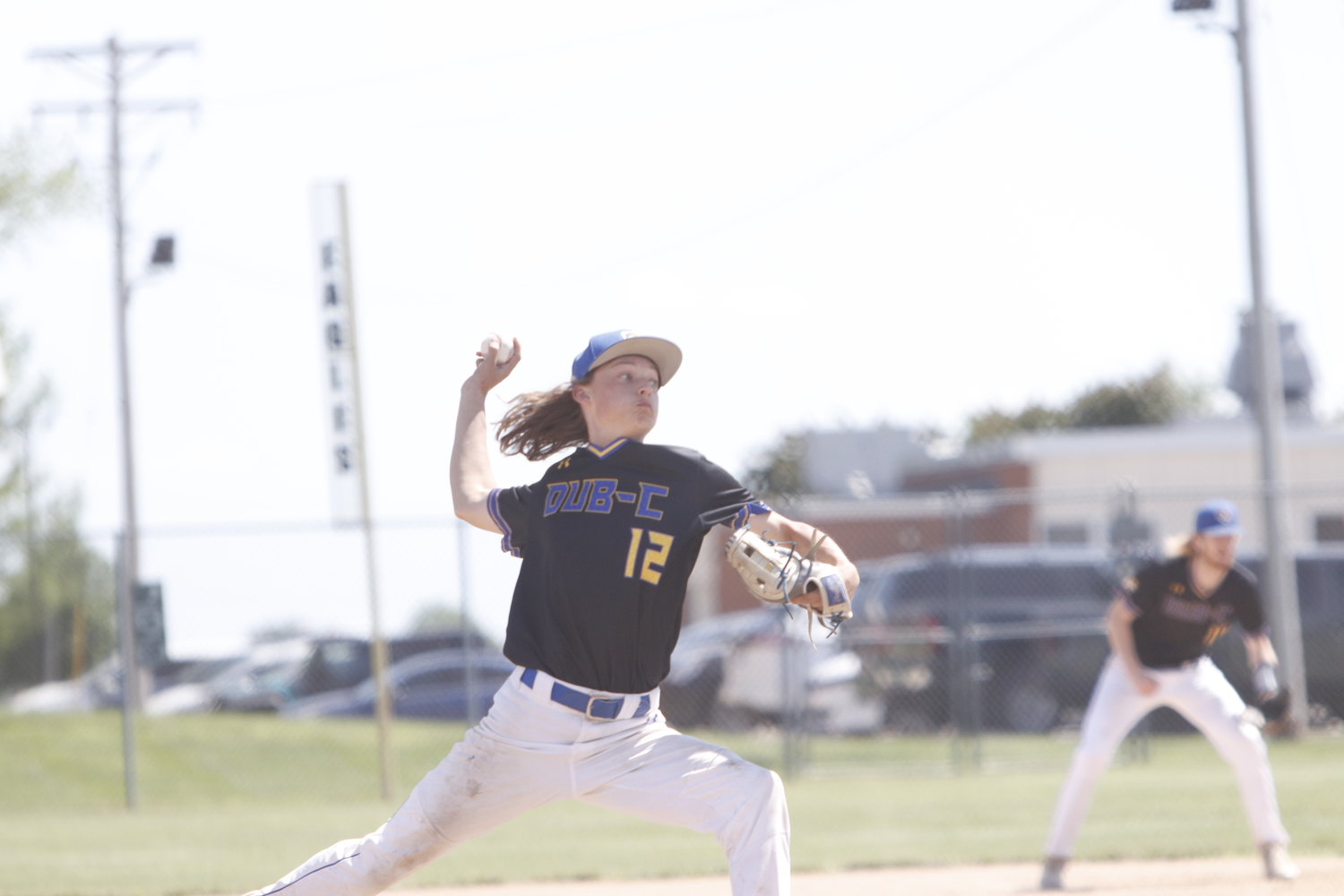 Mason Kunkel delivers a pitch during Monday's district semifinal.