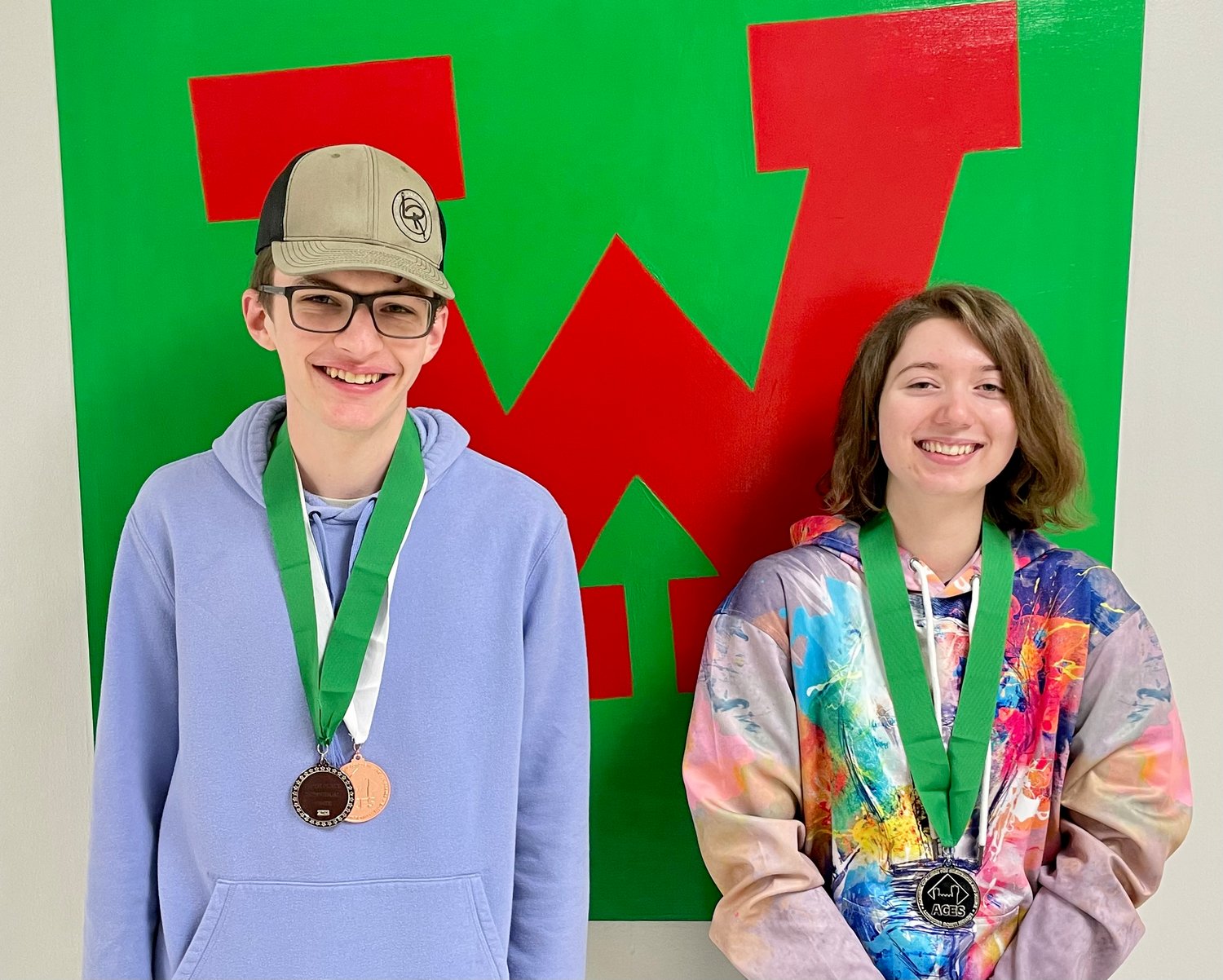 Warrenton High School’s Roy Briggs, left, and Katie Shramek both medaled at the state Academic Challenge competition.