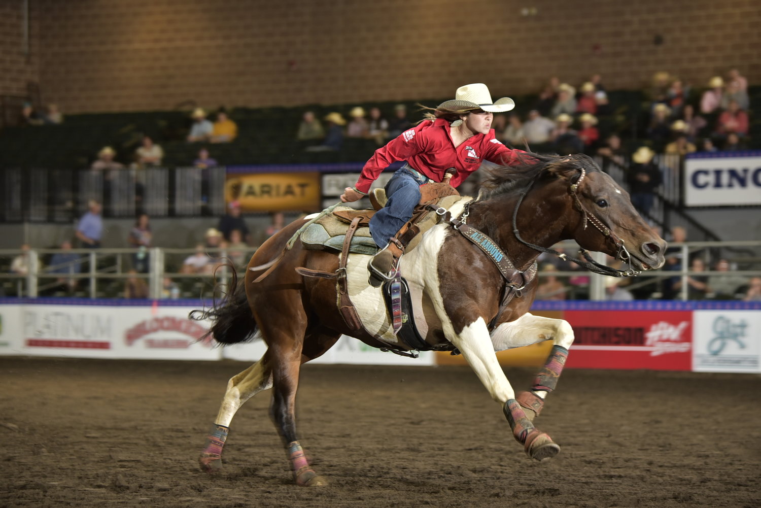 CHAMPION RIDER — Ada Ferrell and her horse race across the ring in one of this year’s rodeo competitions. Ferrell earned top-four placements in multiple categories at the state level and is heading to a national junior high finals event.