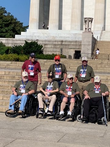 VISIT TO WASHINGTON — St. Louis-area veterans on an honor flight trip to Washington, D.C., stop for a photo during a visit to the Lincoln Memorial.