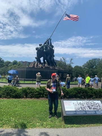 HONORED MARINES — Vincent Ruether, a Marine Corps veteran, takes time to visit a monument of Marines raising a U.S. flag after the battle of Iwo Jima during World War II.