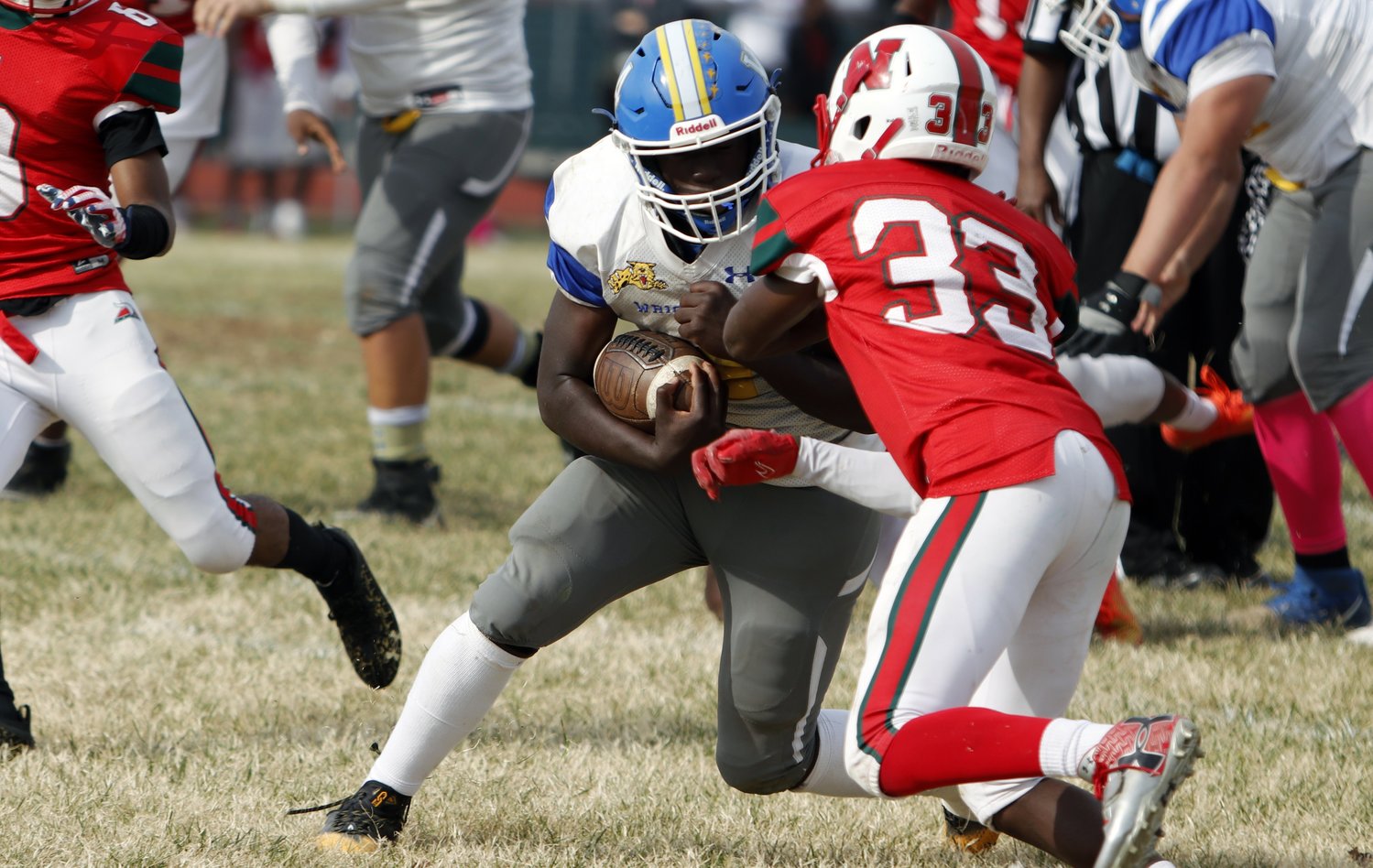 Carleon Jones (left) lowers his shoulder before scoring the go-ahead touchdown in the fourth quarter of Wright City’s win over Normandy Saturday.