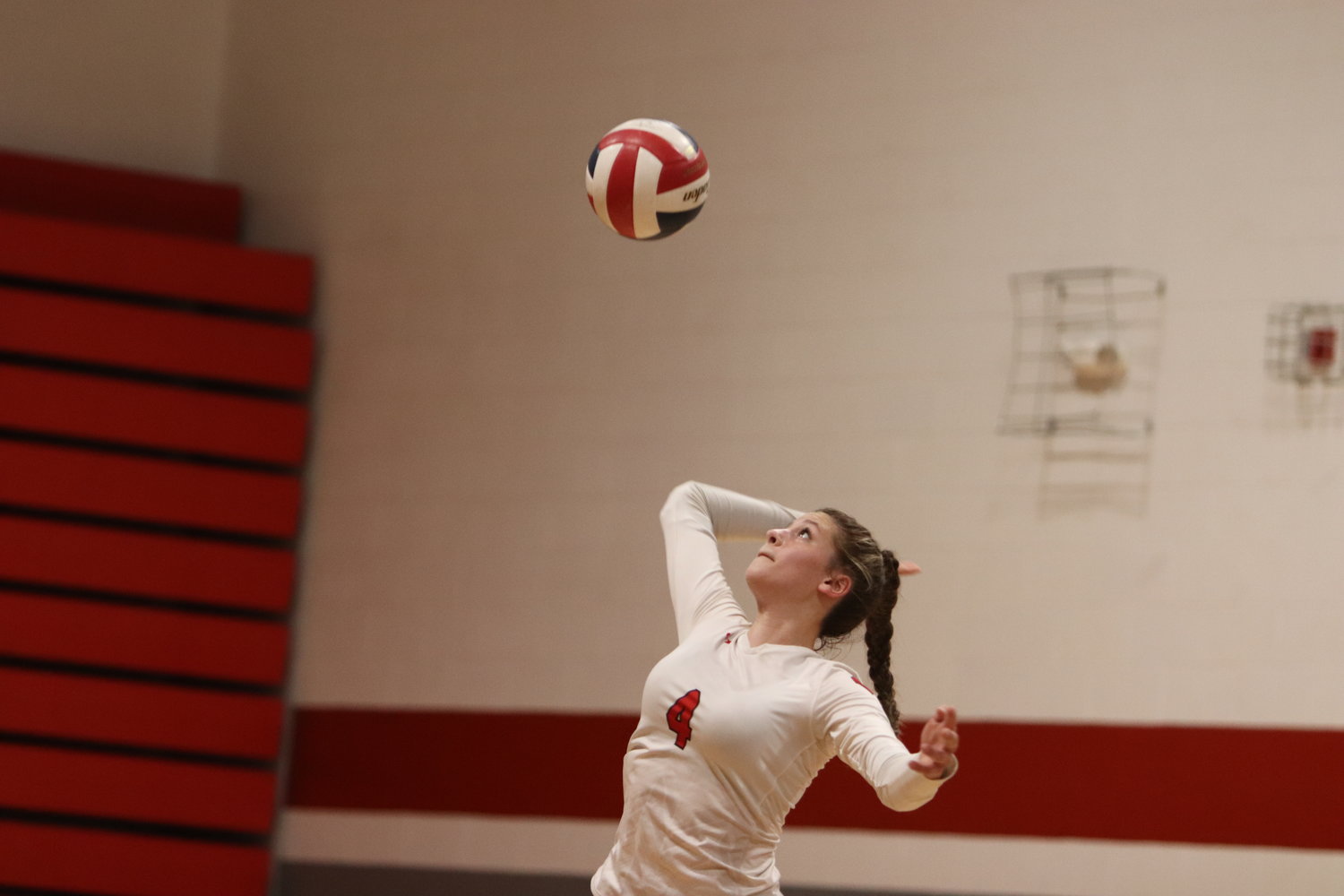 Rayne Van Reed hits a serve during a match earlier this season.