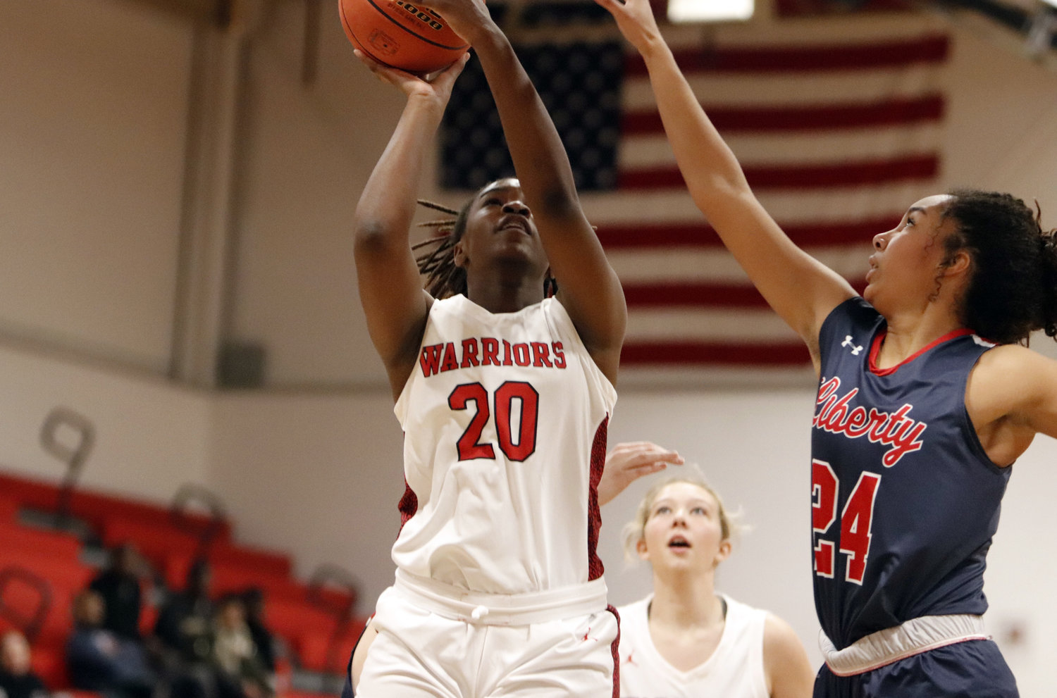 Warrenton junior Neveah Hill scores two of her team-high 14 points in Monday’s win over Liberty.