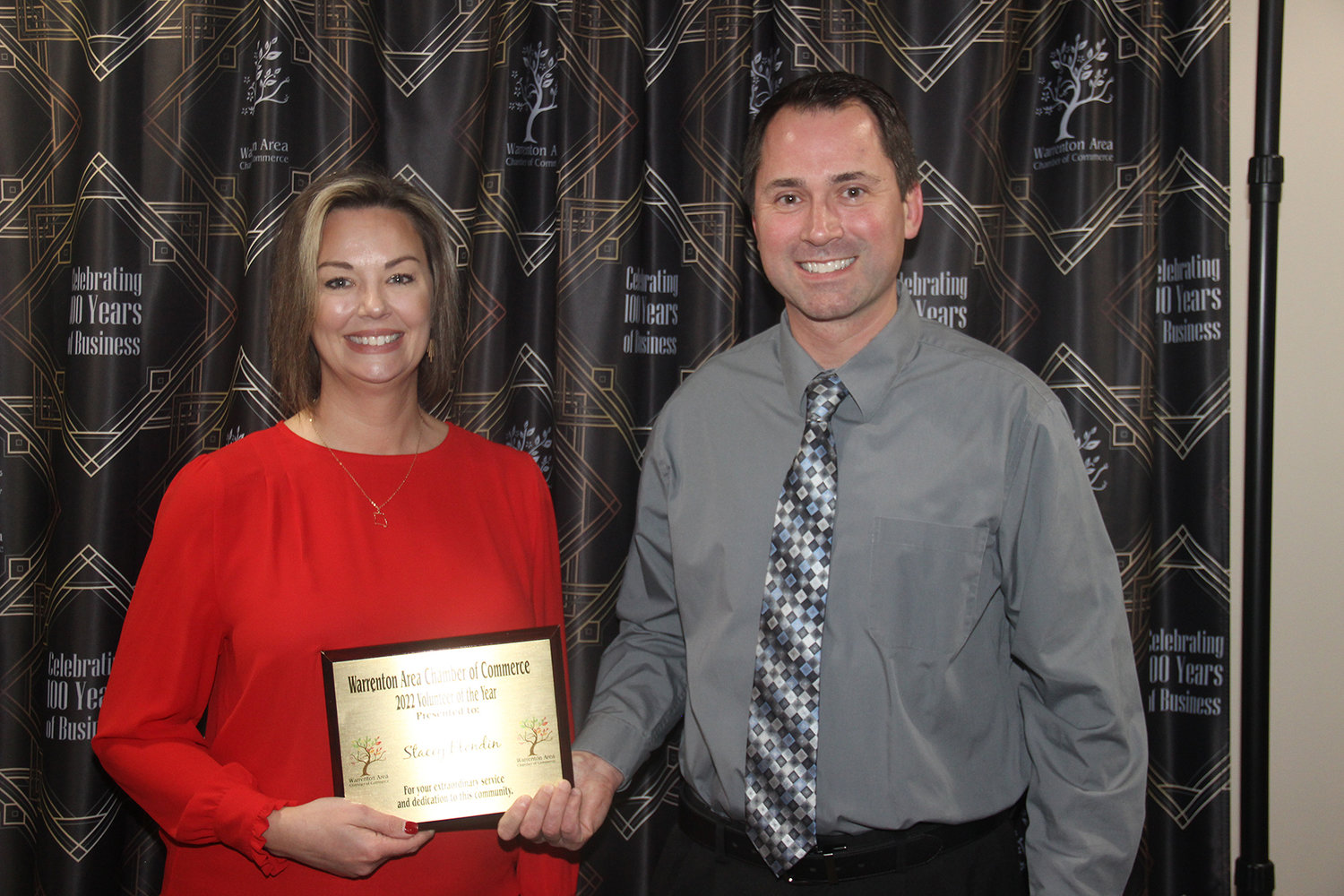 VOLUNTEER OF THE YEAR — Stacey Blondin accepts her award from board member Dan Dieckmann.
