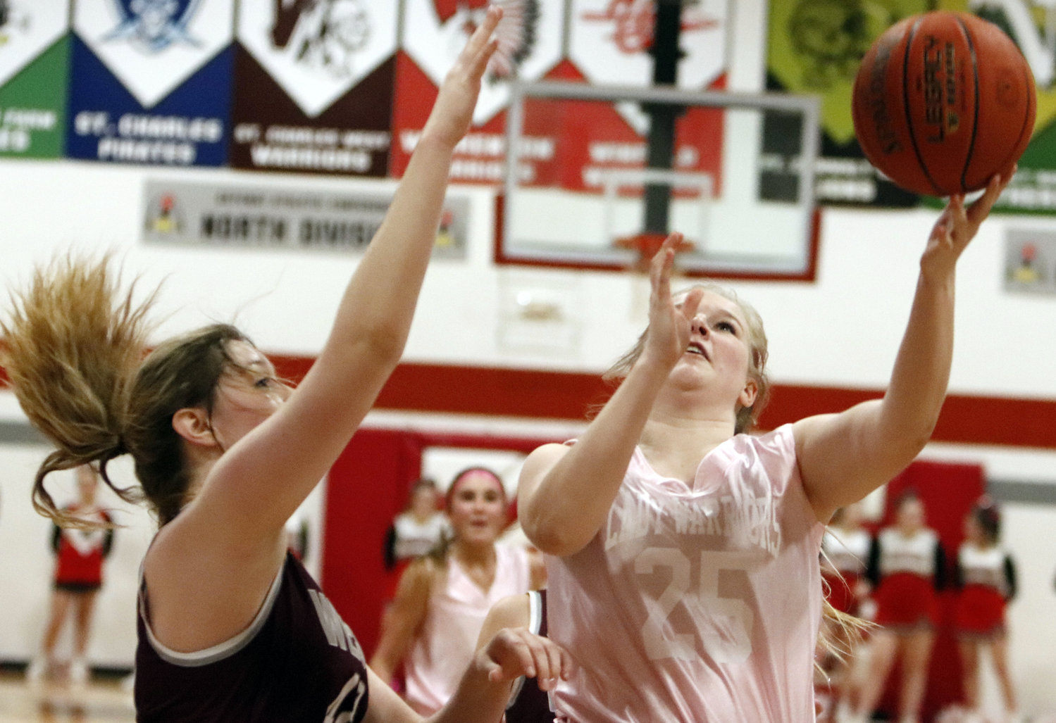 Sophi Mueller attempts a layup during the first half of Friday night’s GAC North win over St. Charles West.