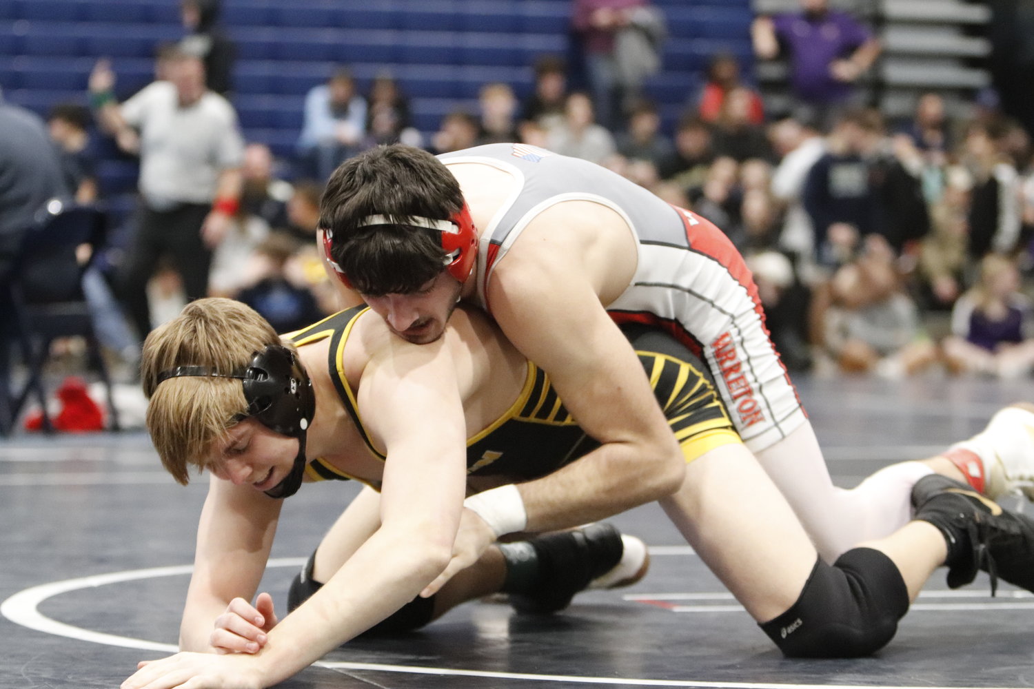 Jacob Ruff (right) wrestles at the St. Charles Invite earlier this month. Ruff earned three wins at the quad meet last week.