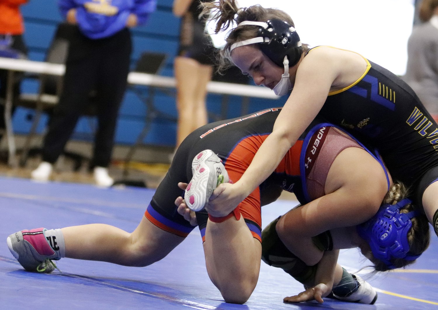 Kali Jensen (right) competes at the Wright City Invite earlier this season. Jensen finished first place in the 115-pound weight class at the St. Clair Invitational last weekend.