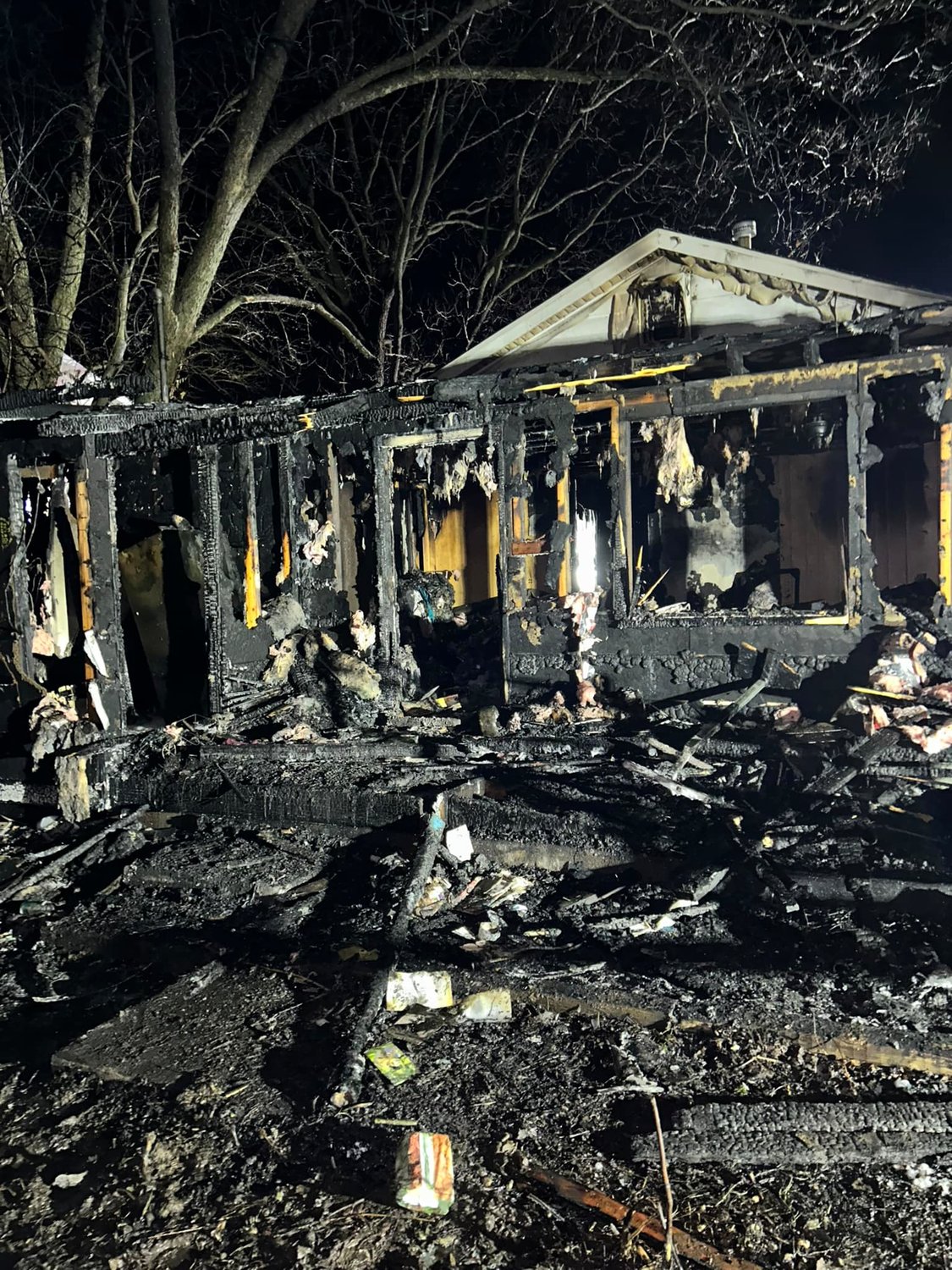HOUSE FIRE — A fire destroyed the interior of a home in Truesdale Jan. 19. Neighbors worked together to rescue a woman trapped in the house.