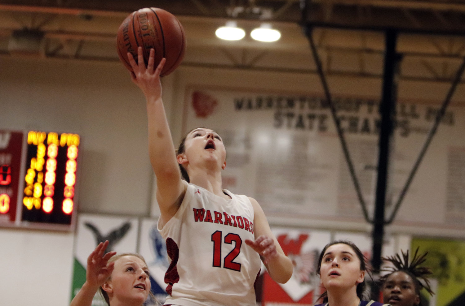 Warrenton senior Audrey Payne prepares goes up for a layup during the first half of Warrenton’s win over Hallsville.