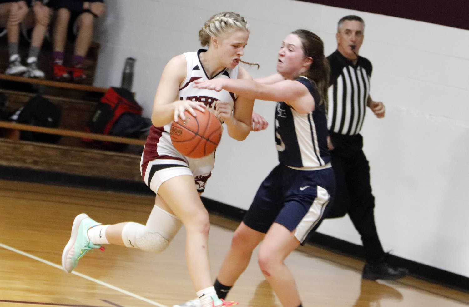 Alli Meyer (left) drives to the basket during a game earlier this season.