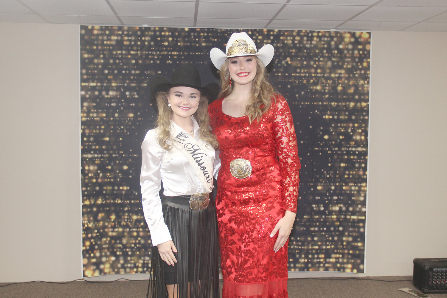 MISS TEEN RODEO — Twi-Anna Coleman, right, accepts the crown of Miss Teen Rodeo Missouri from her predecessor, Stevie Wood, during a coronation event Jan. 28 in Warrenton. Coleman is a Warrenton native who will travel to help represent the sport of rodeo for a year.
