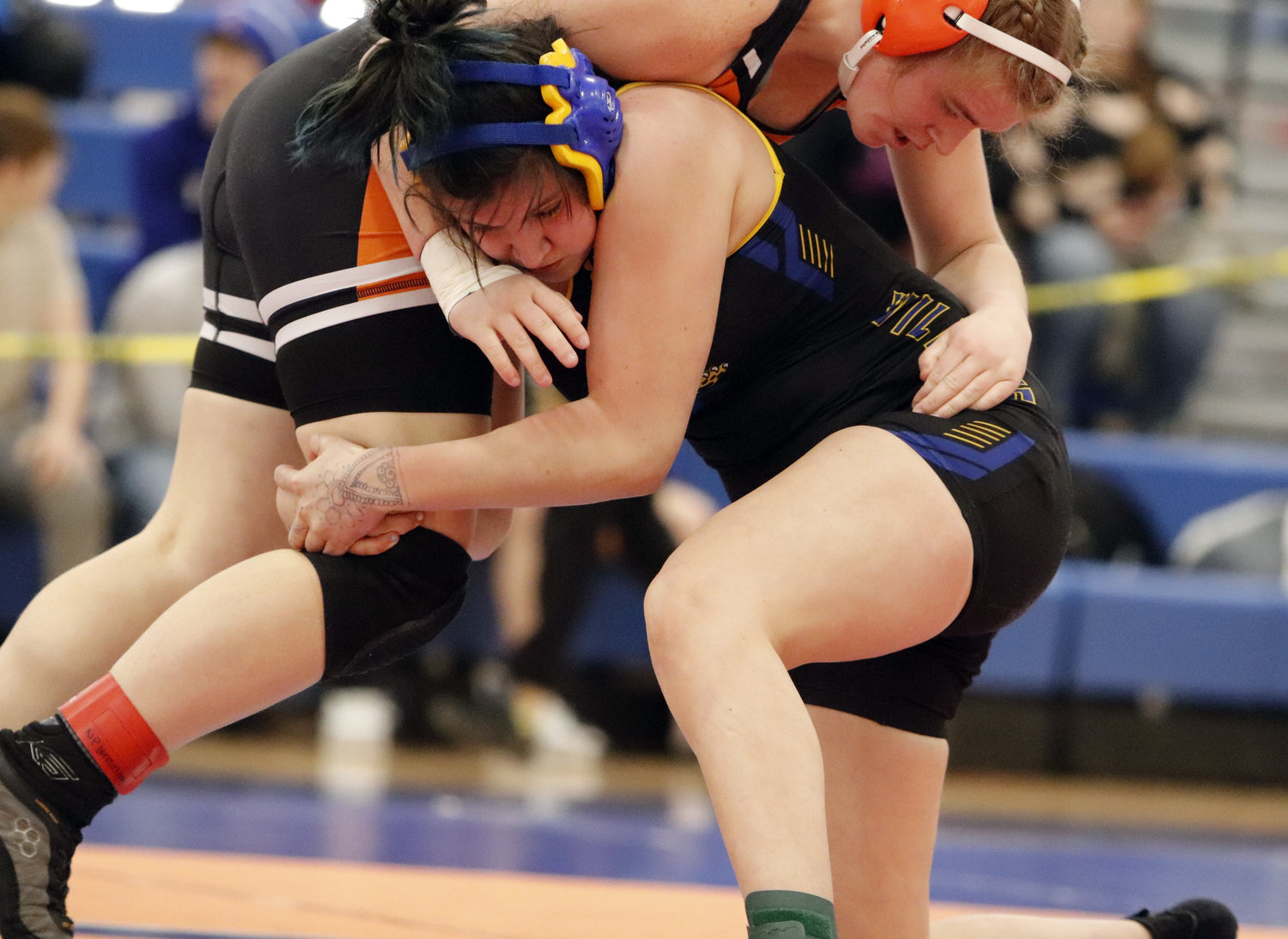 Wright City sophomore Caelyn Hanff (right) wrestles in the semifinals at Saturday’s Class 1, District 2 Tournament. Hanff won a district title in the 170-pound weight class.