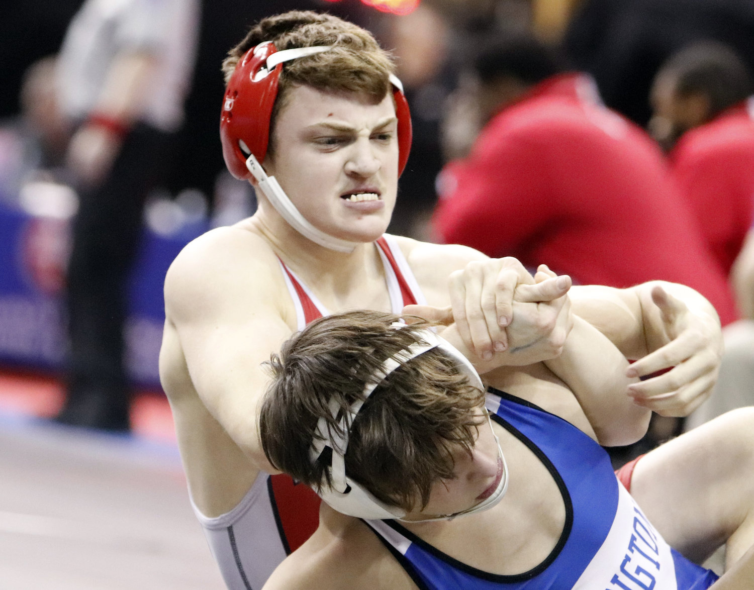 Joshua Kassing (left) controls his Dominic Stafford of Jefferson City during the Class 3 state wrestling tournament.