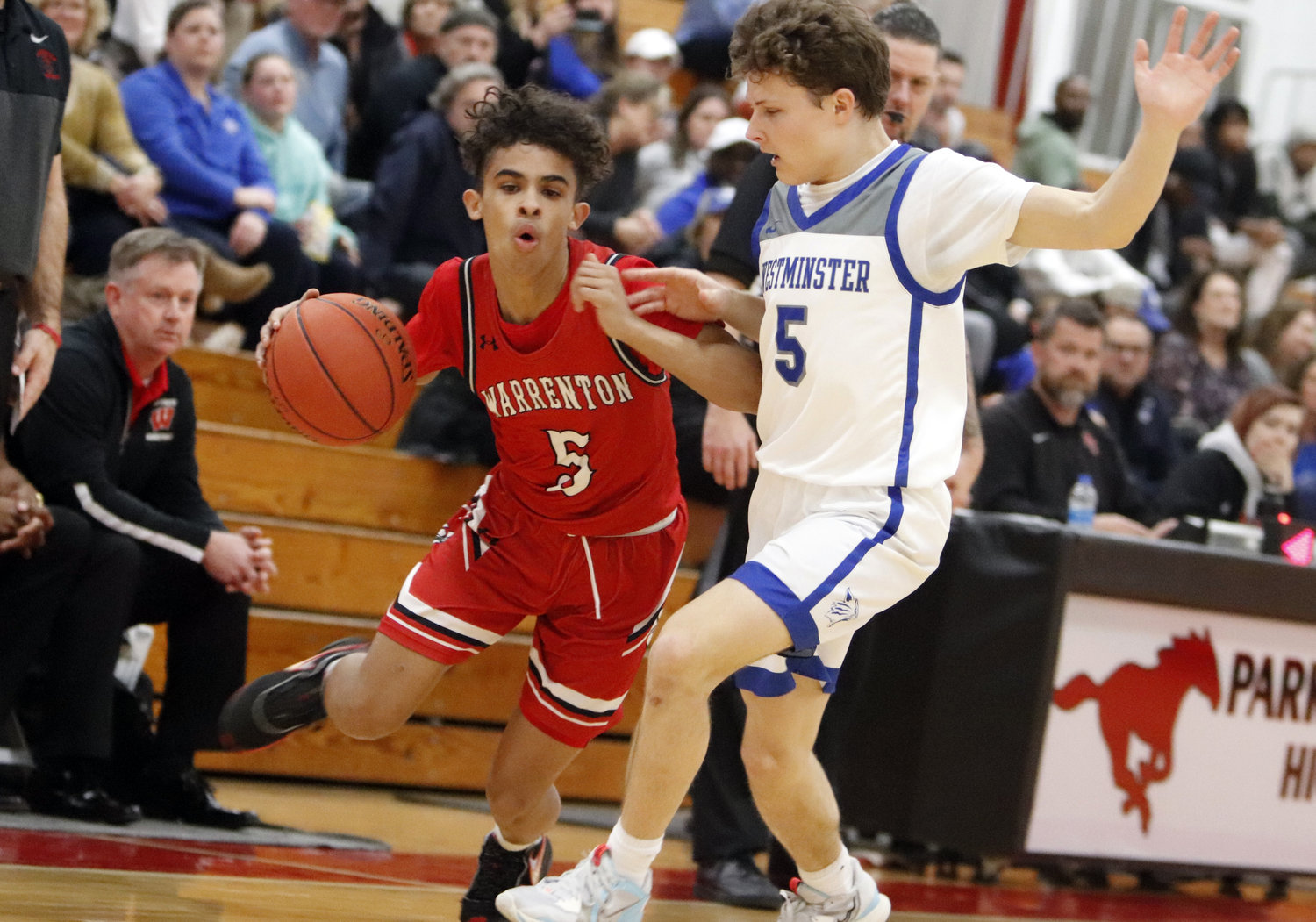 Warrenton freshman Deadrick Forrest (left) attempts to get past Westminster Christian’s Will Warren during last week’s district semifinal matchup at Parkway Central High School.