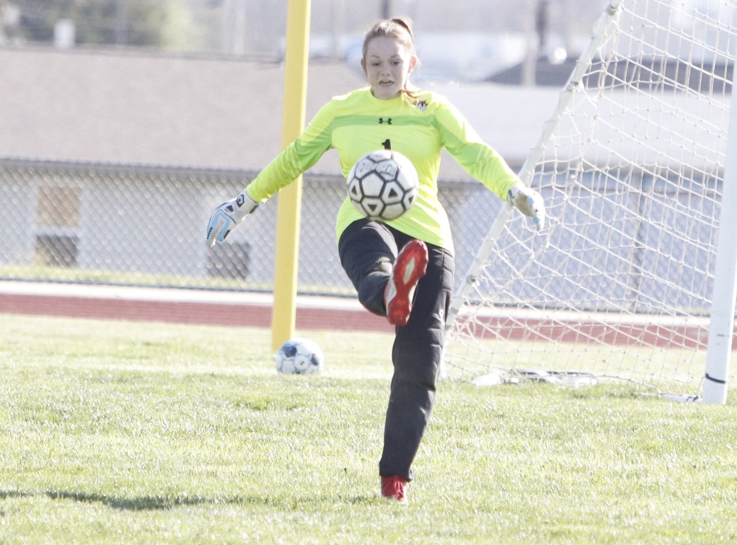 Wright City goalie Cassie Reash kicks the ball after making a save during the first half of Monday’s game.
