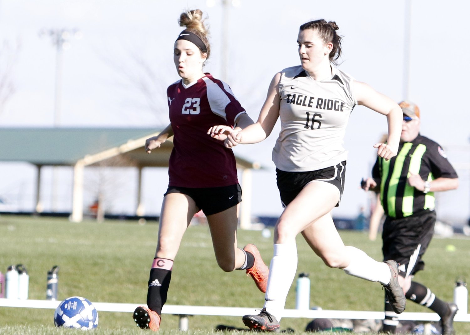 Anna Meyer (left) chases after the ball during a game against Eagle Ridge Christian earlier this season. Meyer scored two goals in Liberty Christian’s win over Crosspoint Christian last week.