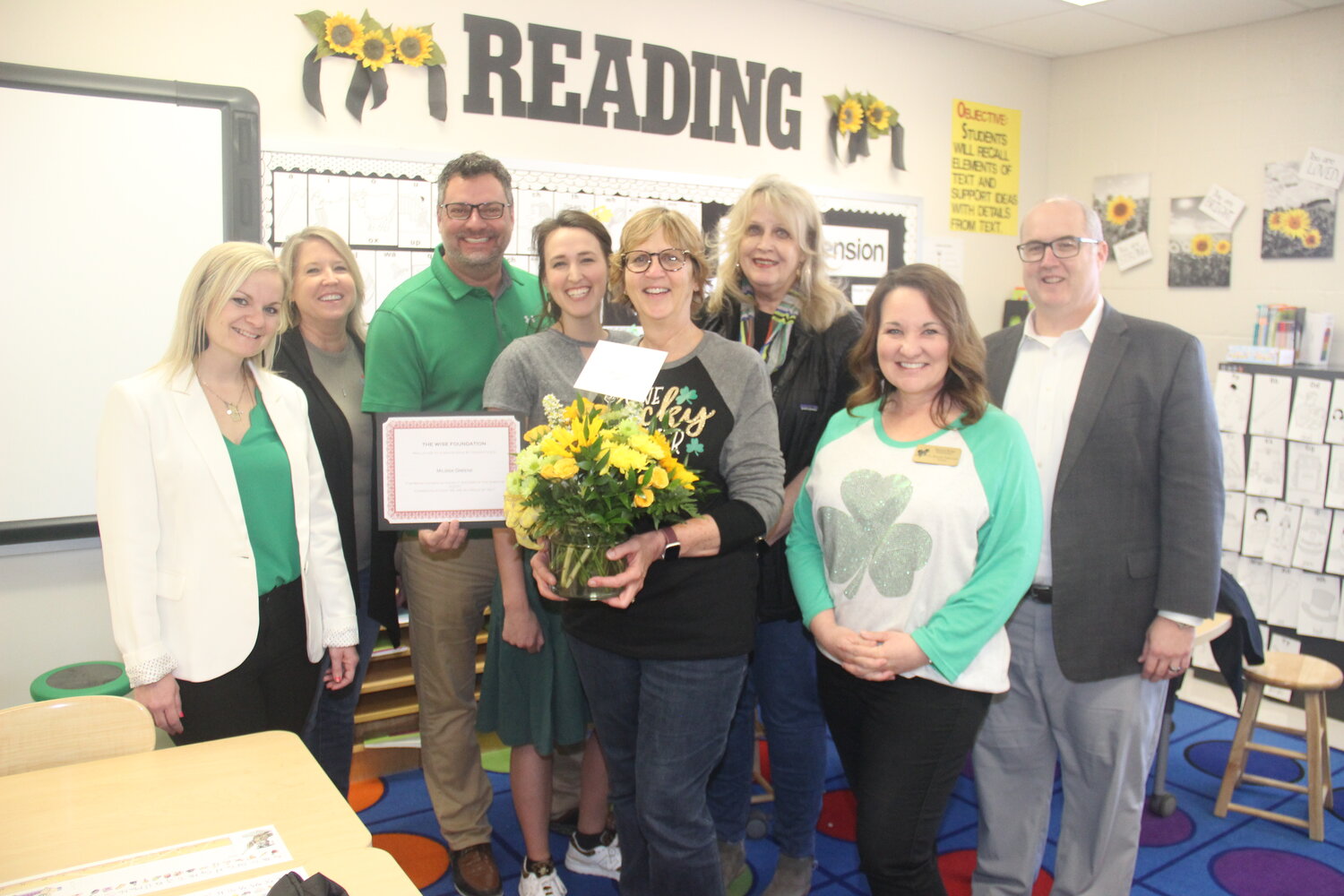 TEACHER OF THE YEAR — Milissa Greene (center) is Warren County R-III School District’s Teacher of the Year. Greene is a special education teacher at Warrior Ridge Elementary. She was joined by coworkers to congratulate her for the award.