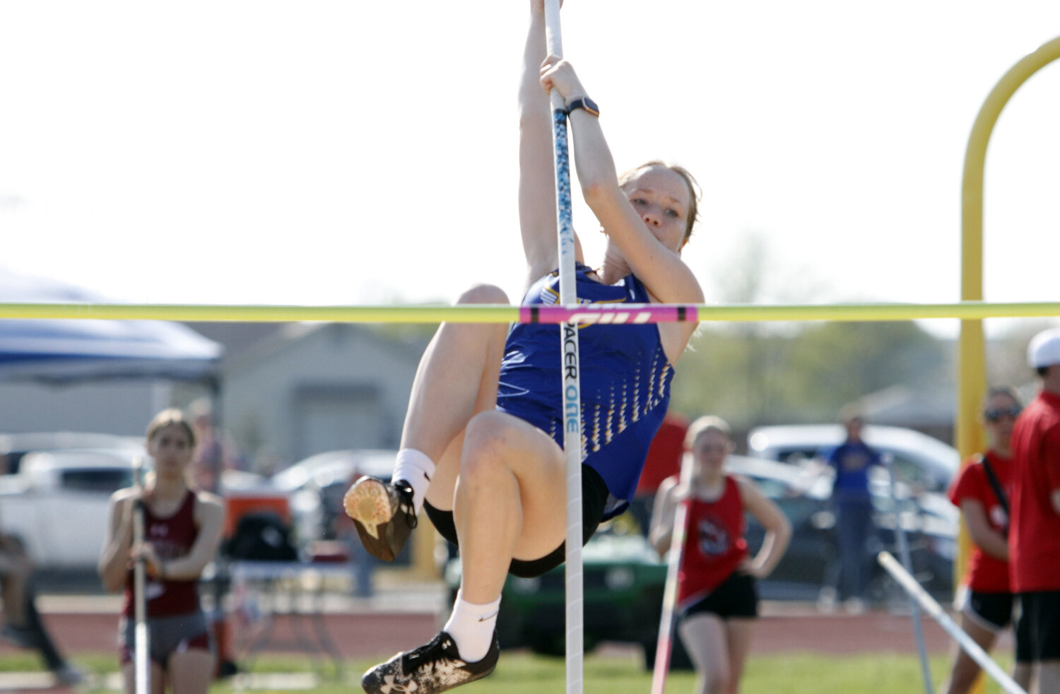 Wright City's Kaedyn Johnson attempts to clear the bar during the pole vault competition at last week's Wright City Invite.
