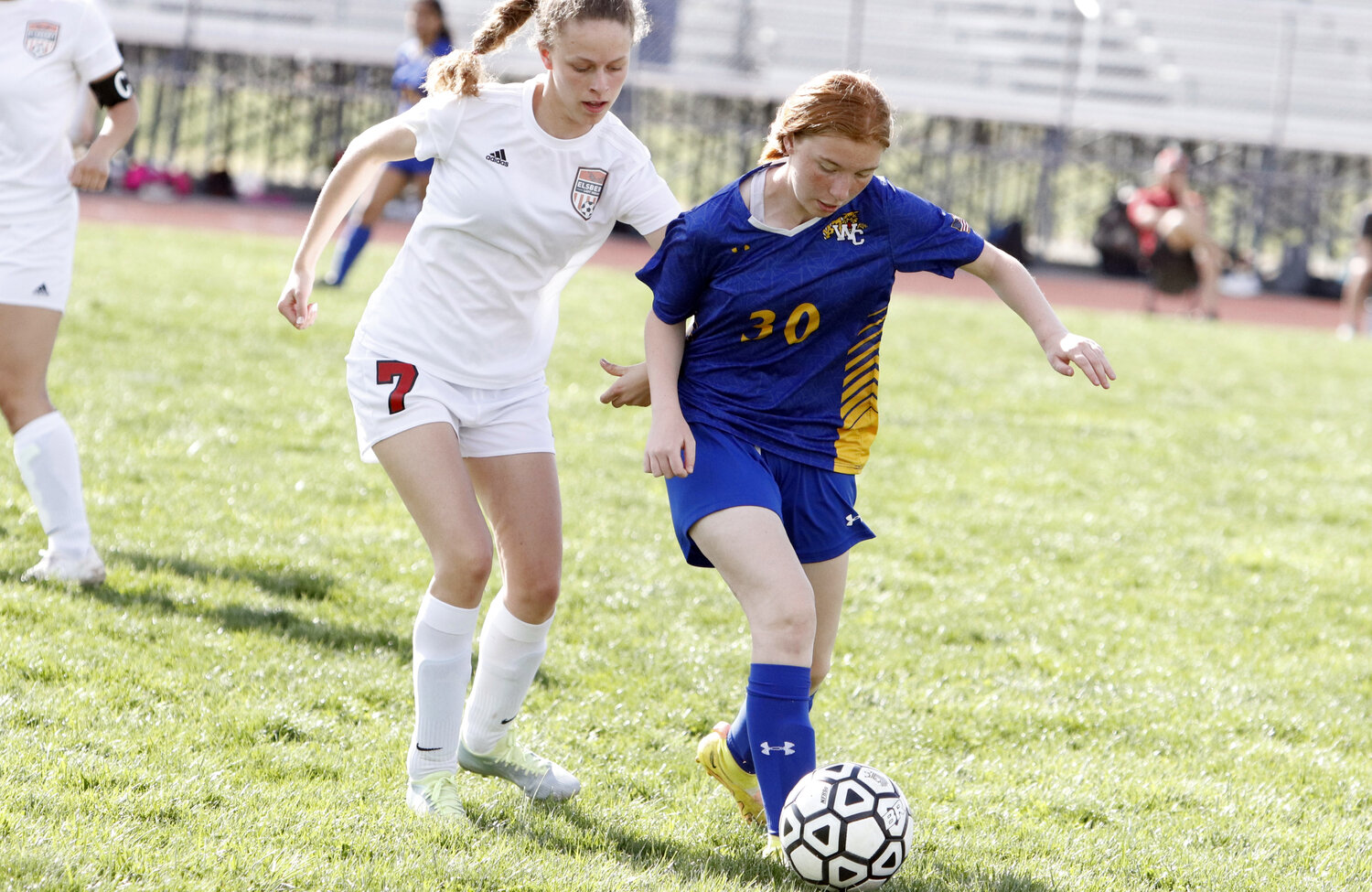 Sophomore Rylee Schaefer (right) attempts to get past an Eslberry defender during last week's game.