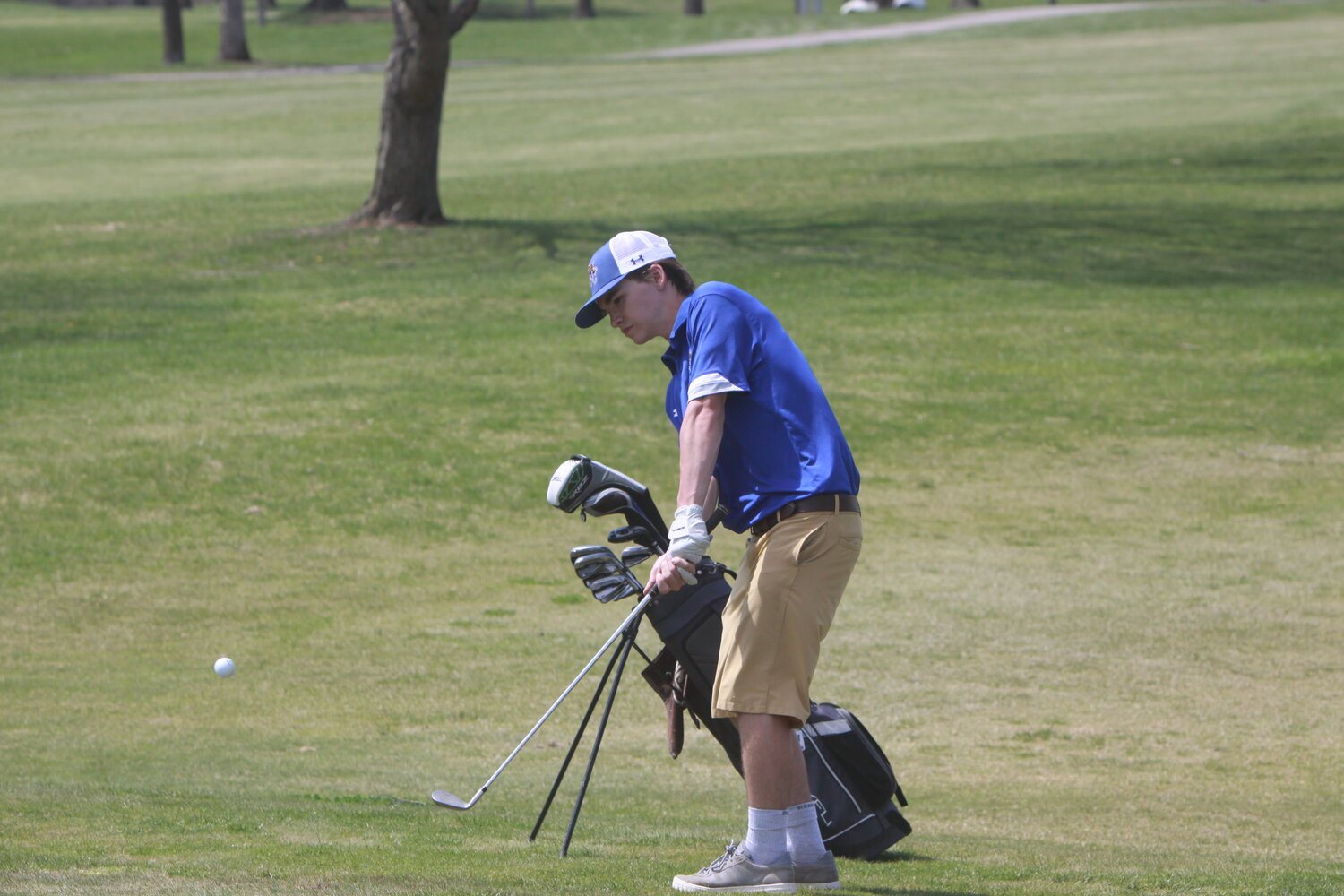 Wright City’s Aiden O’Donnell makes a chip shot at the No. 3 hole at the Warrenton Invitational on April 14 at Country Lake Golf Club.