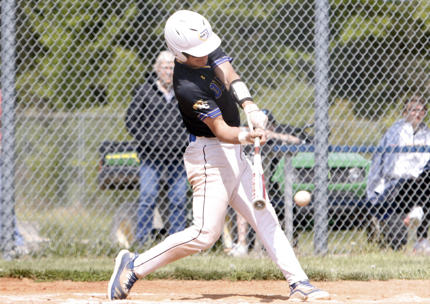 Blaine Niemann connects on a single during the third inning of Wright City's win.